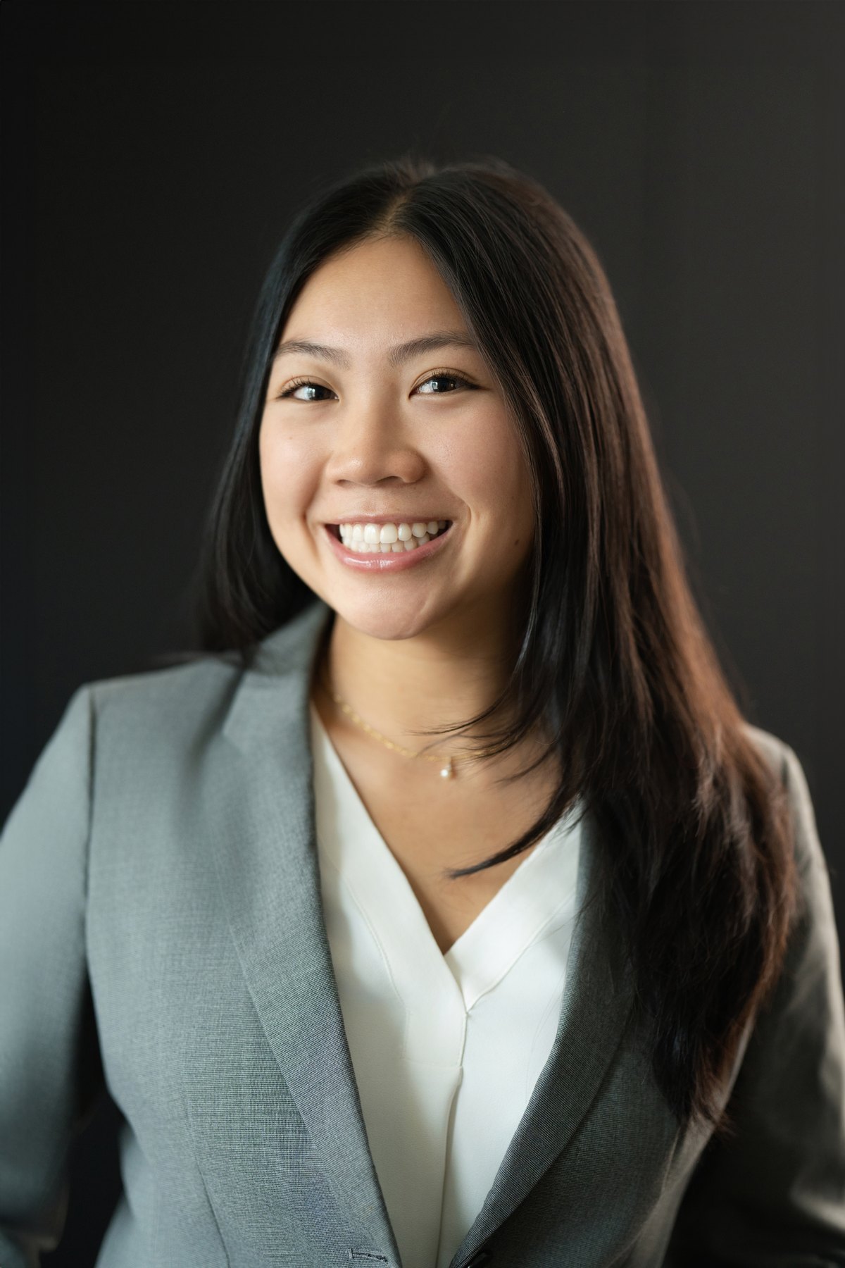Corporate headshot on a seamless studio backdrop